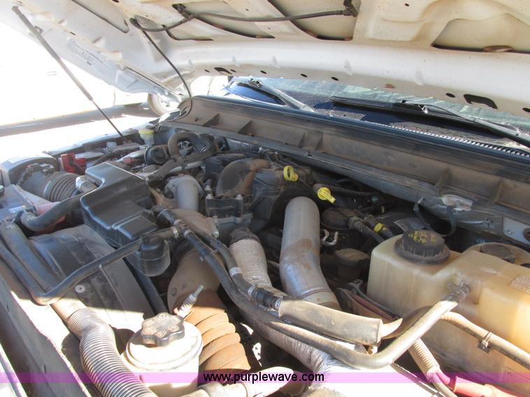 image for item J7688 2011 Ford F350 Super Duty SuperCab flatbed pickup truck