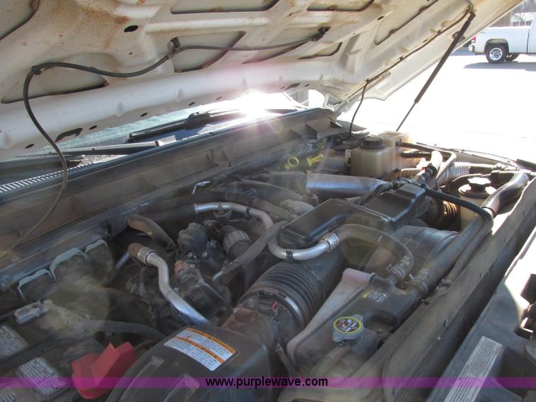 image for item J7688 2011 Ford F350 Super Duty SuperCab flatbed pickup truck