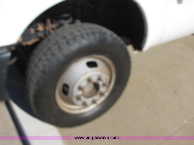 image for item J7688 2011 Ford F350 Super Duty SuperCab flatbed pickup truck