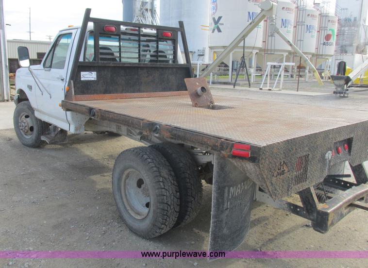 image for item L4229 1997 Ford F350 flatbed pickup truck