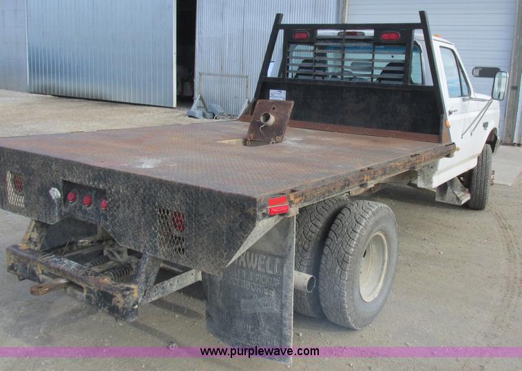 image for item L4229 1997 Ford F350 flatbed pickup truck
