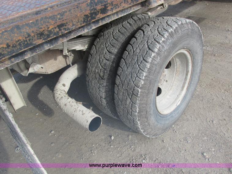 image for item L4229 1997 Ford F350 flatbed pickup truck