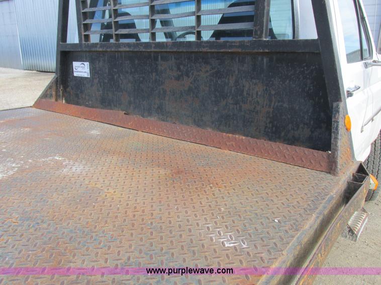 image for item L4229 1997 Ford F350 flatbed pickup truck