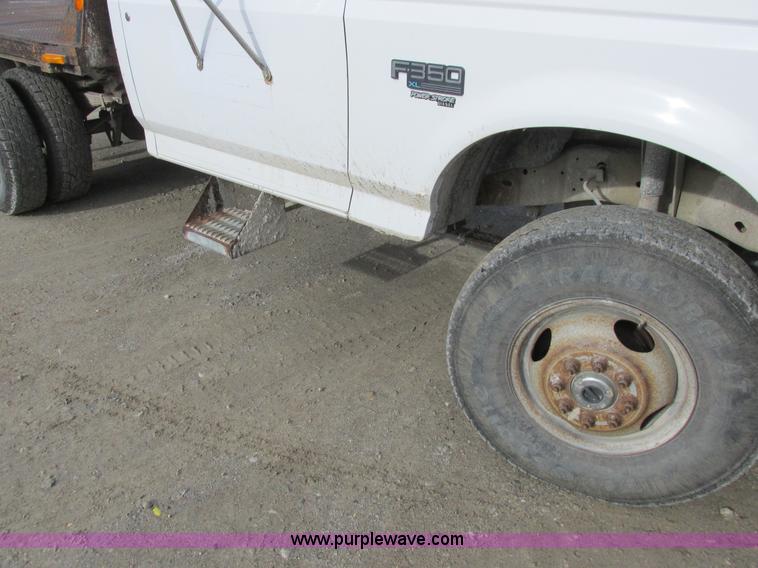 image for item L4229 1997 Ford F350 flatbed pickup truck