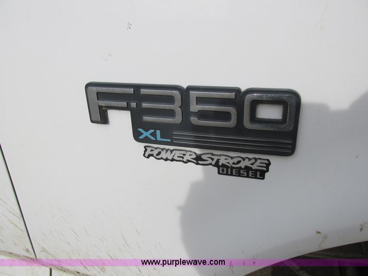 image for item L4229 1997 Ford F350 flatbed pickup truck