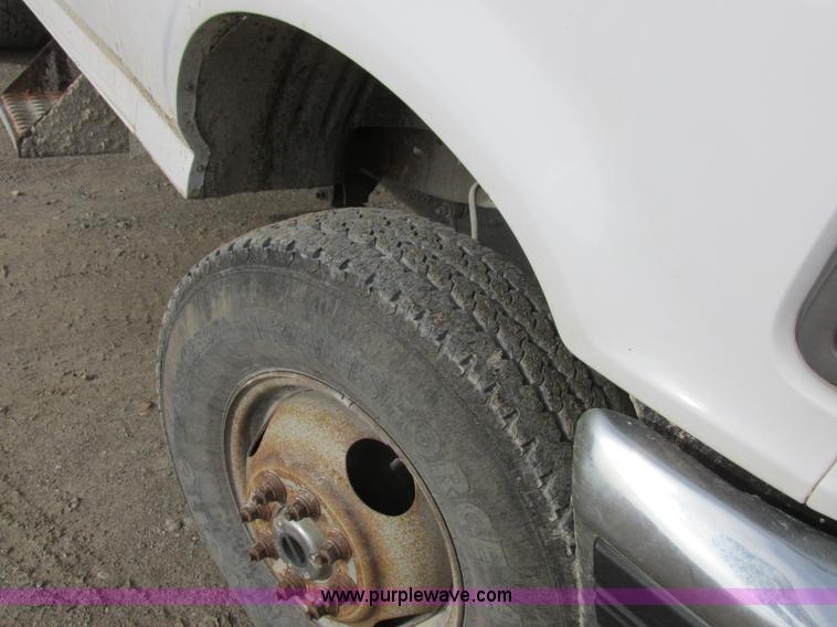 image for item L4229 1997 Ford F350 flatbed pickup truck