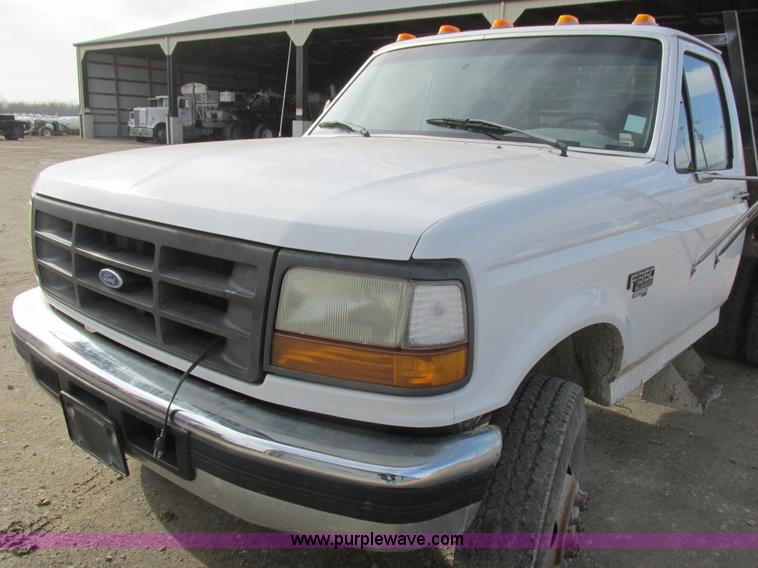 image for item L4229 1997 Ford F350 flatbed pickup truck
