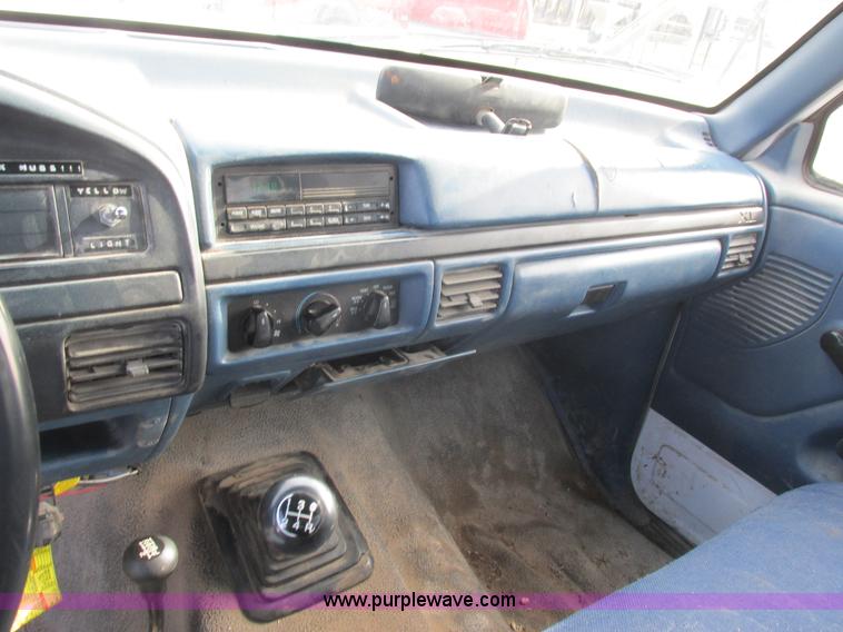 image for item L4229 1997 Ford F350 flatbed pickup truck