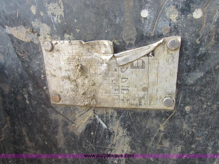 image for item I1801 2005 John Deere 325 skid steer