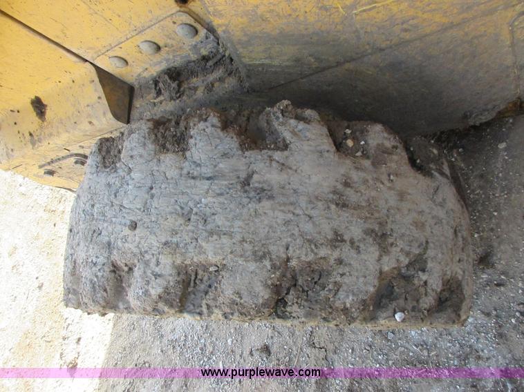 image for item I1801 2005 John Deere 325 skid steer