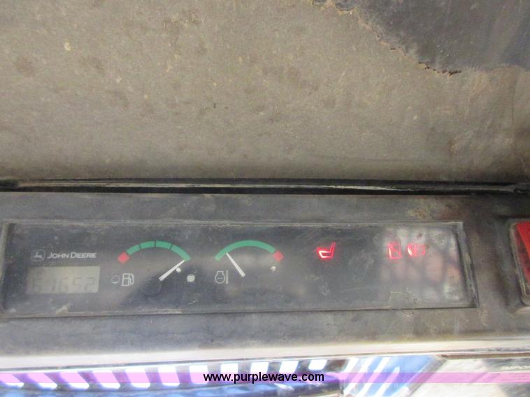 image for item I1801 2005 John Deere 325 skid steer