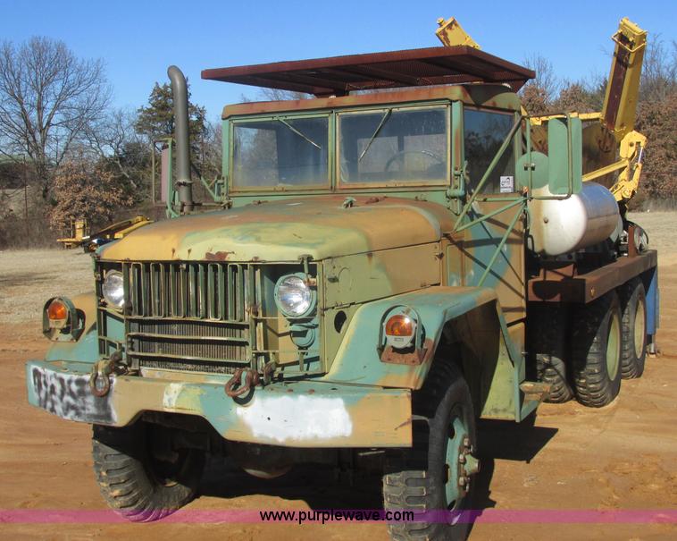 image for item J2327 1978 GMC M35A2 truck with tree transplanter