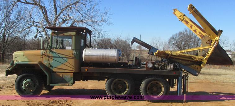 image for item J2327 1978 GMC M35A2 truck with tree transplanter