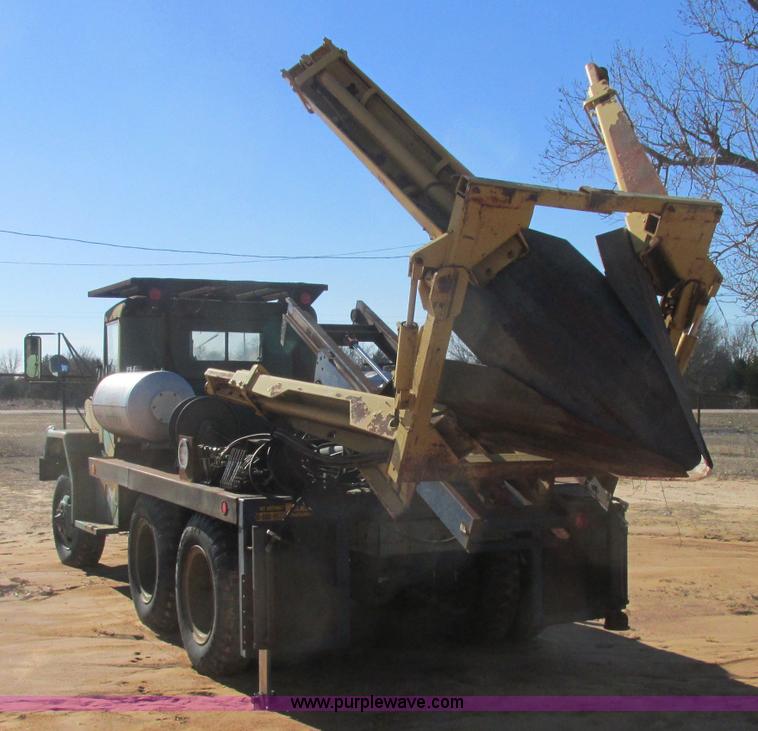 image for item J2327 1978 GMC M35A2 truck with tree transplanter