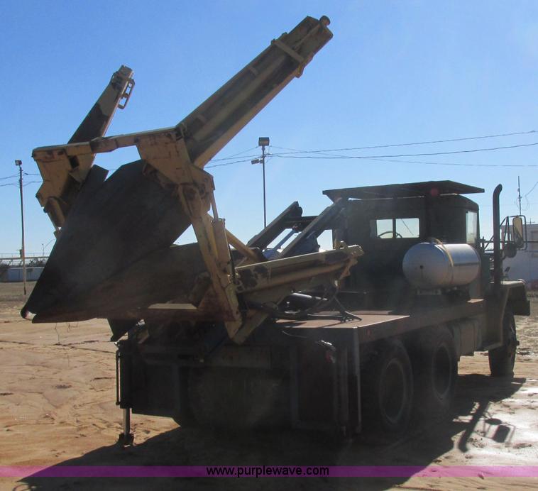 image for item J2327 1978 GMC M35A2 truck with tree transplanter