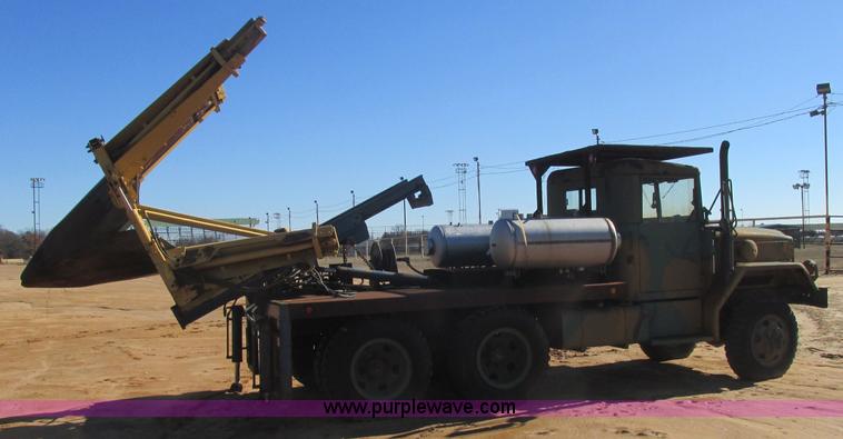 image for item J2327 1978 GMC M35A2 truck with tree transplanter