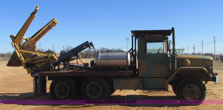 image for item J2327 1978 GMC M35A2 truck with tree transplanter