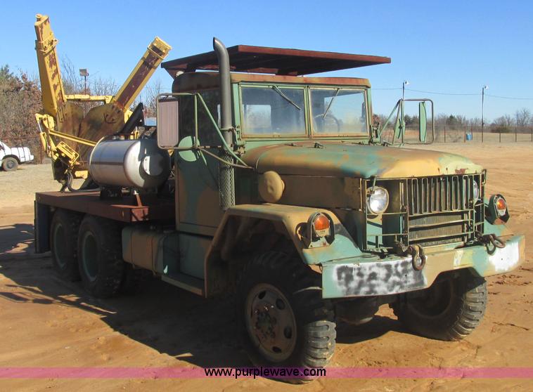 image for item J2327 1978 GMC M35A2 truck with tree transplanter