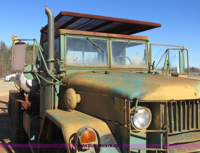 image for item J2327 1978 GMC M35A2 truck with tree transplanter