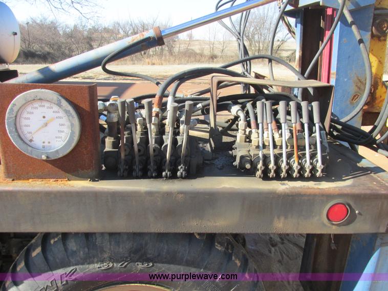 image for item J2327 1978 GMC M35A2 truck with tree transplanter