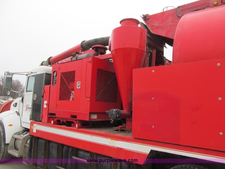 image for item L1977 2006 Peterbilt 335 vacuum truck