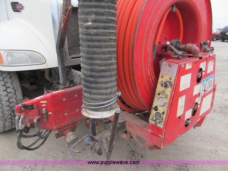 image for item L1977 2006 Peterbilt 335 vacuum truck