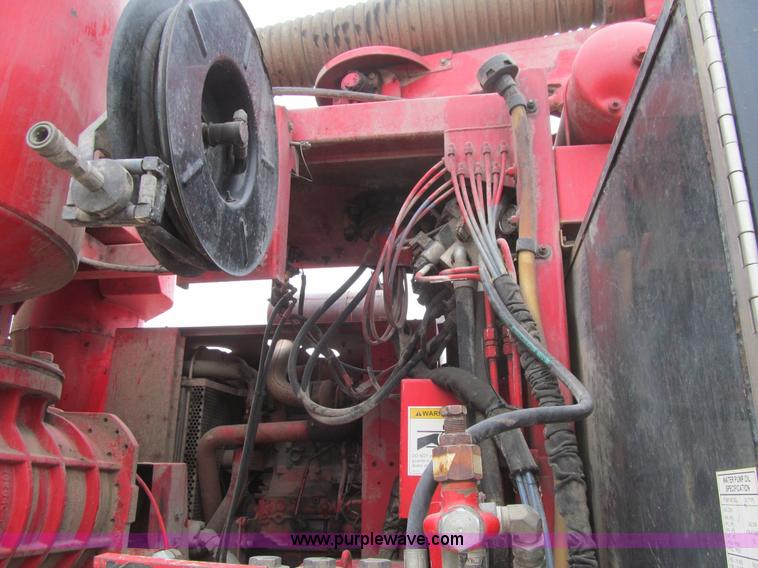 image for item L1977 2006 Peterbilt 335 vacuum truck