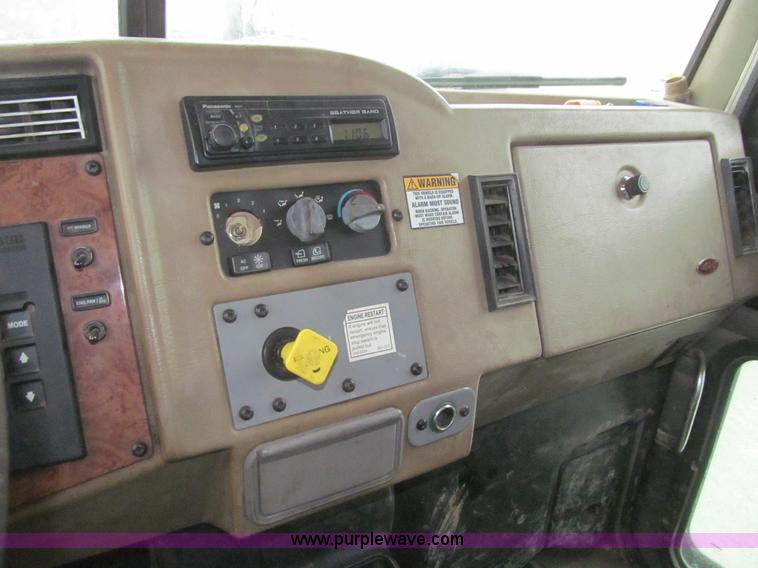 image for item L1977 2006 Peterbilt 335 vacuum truck