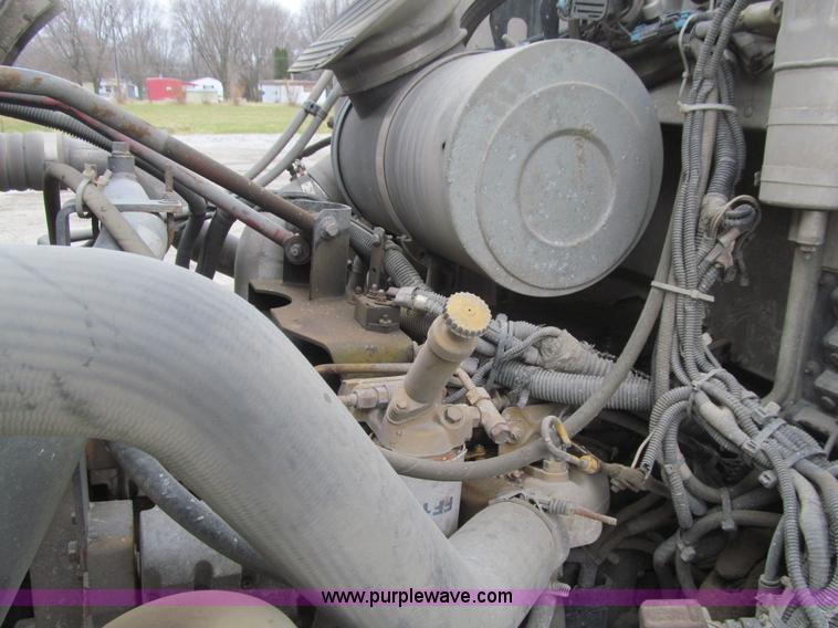 image for item L1977 2006 Peterbilt 335 vacuum truck