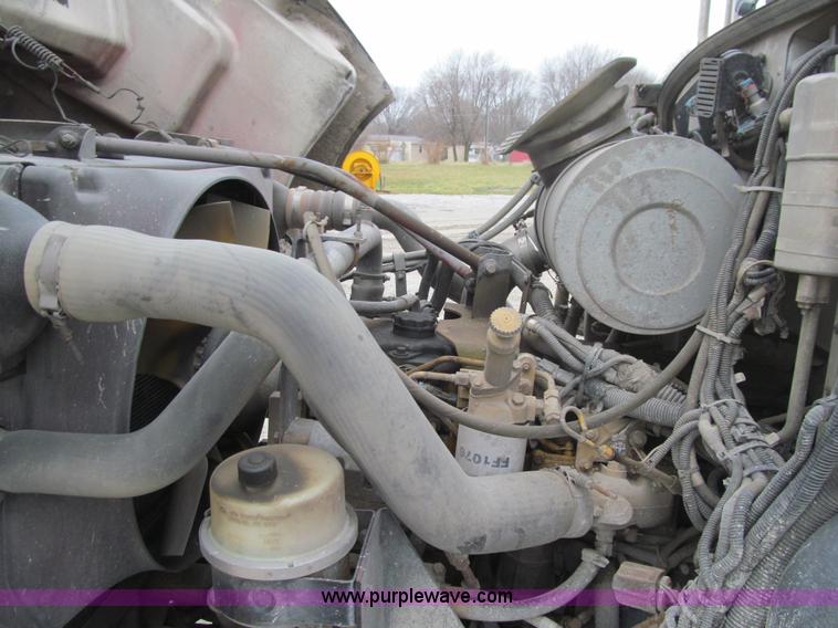 image for item L1977 2006 Peterbilt 335 vacuum truck