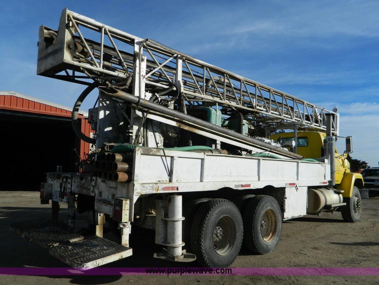 image for item L7299 1987 GMC Brigadier drill rig truck