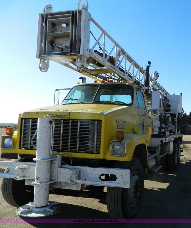image for item L7299 1987 GMC Brigadier drill rig truck
