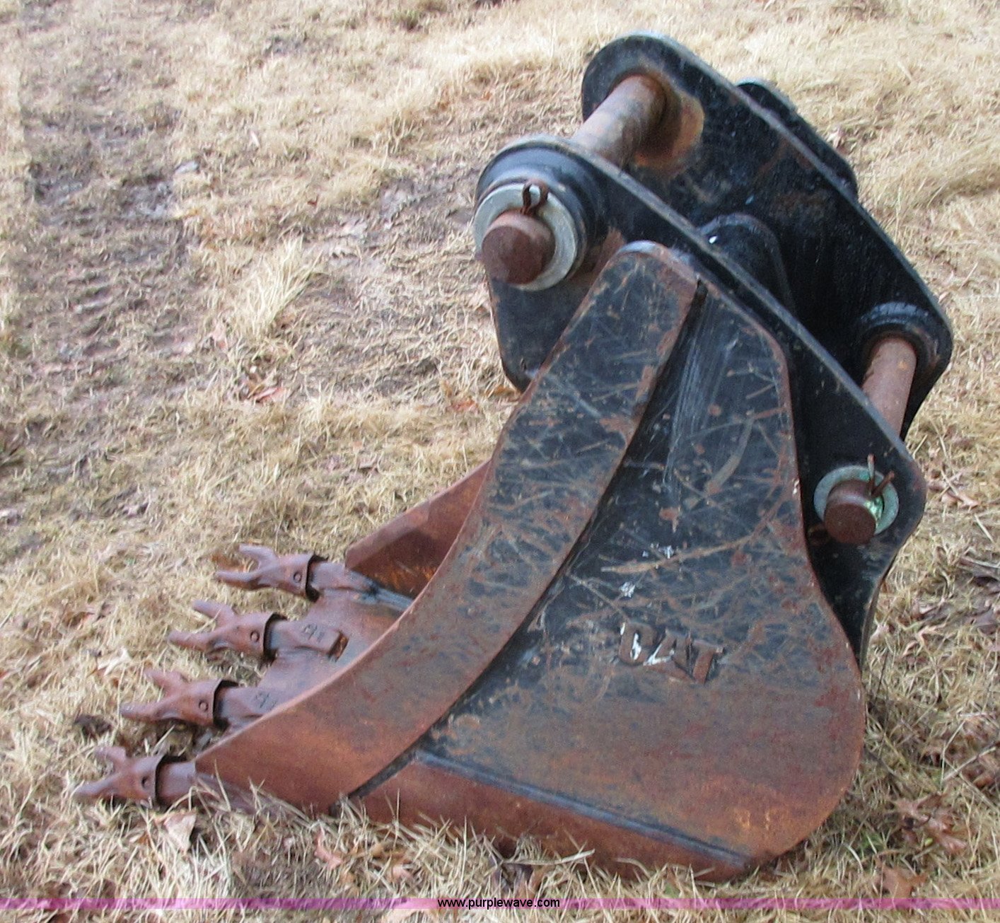 Caterpillar backhoe bucket in Claremore, OK Item I1770 sold Purple Wave