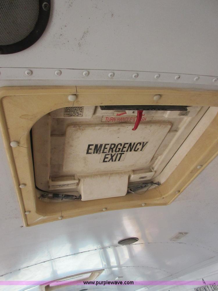 image for item I1813 2001 Blue Bird TC2000 school bus