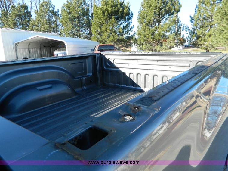 image for item L7301 2008 Dodge Ram 1500 Quad Cab pickup truck