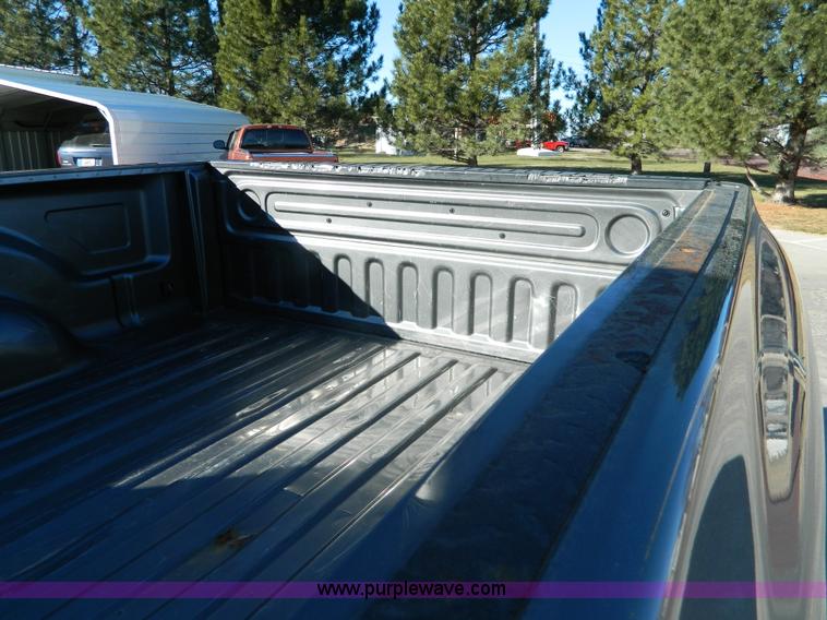 image for item L7301 2008 Dodge Ram 1500 Quad Cab pickup truck