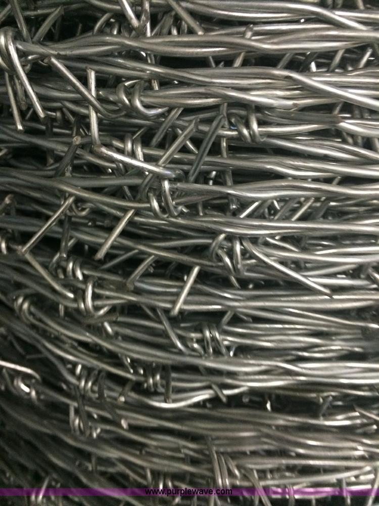 image for item F1000 (27) rolls of four point barbed wire