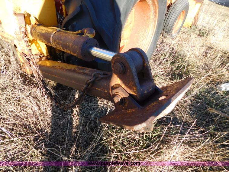 image for item J7409 Case 580 backhoe