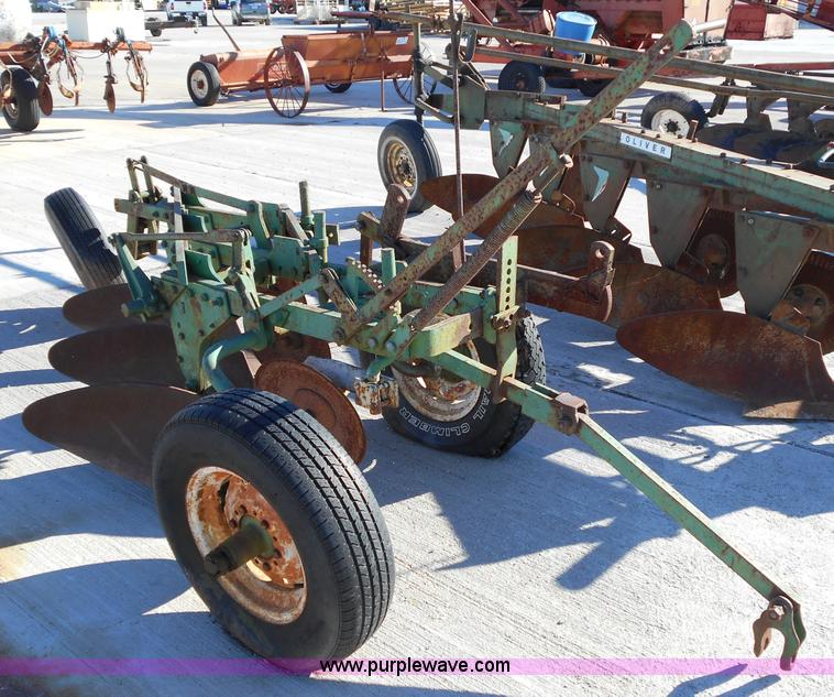 image for item L1141 Oliver three bottom plow