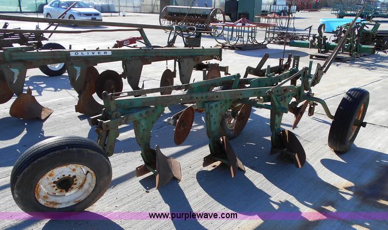 image for item L1141 Oliver three bottom plow