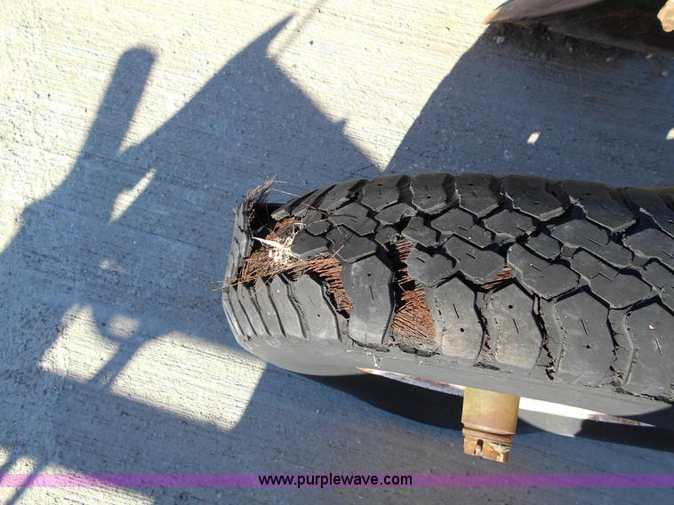 image for item L1141 Oliver three bottom plow