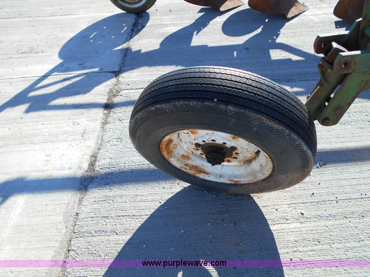 image for item L1141 Oliver three bottom plow