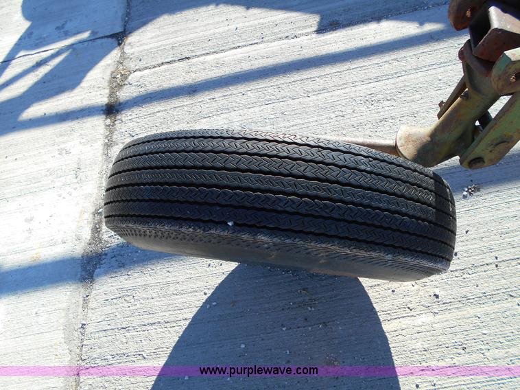 image for item L1141 Oliver three bottom plow