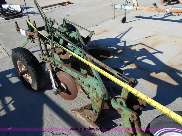 image for item L1141 Oliver three bottom plow