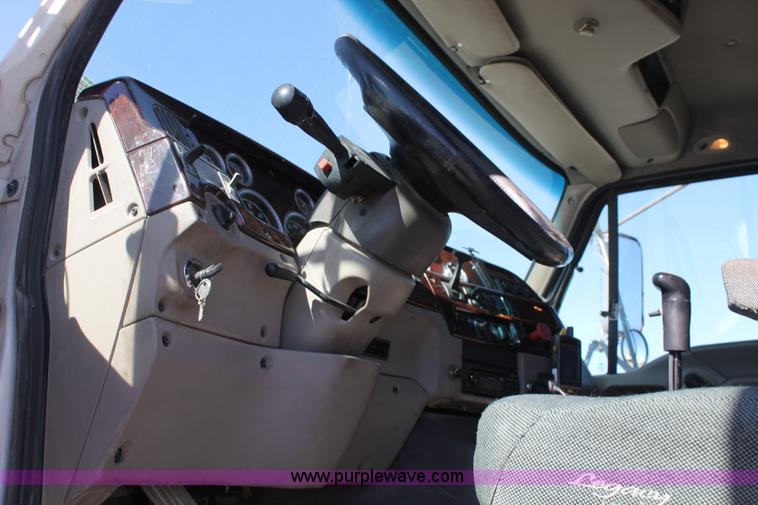 image for item BJ9354 2006 Sterling A9500 rollback truck