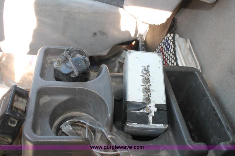 image for item BJ9354 2006 Sterling A9500 rollback truck