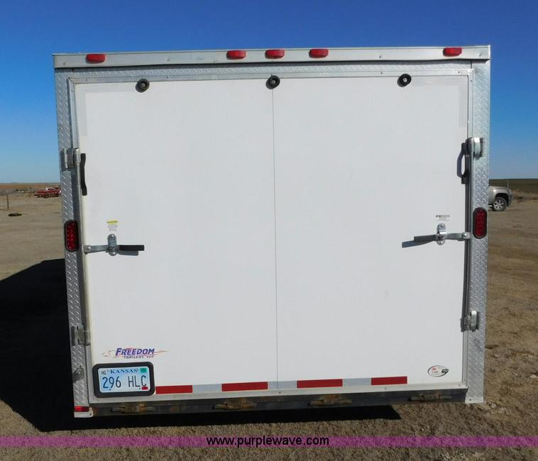 image for item J6827 2013 Freedom 85X20TA2 enclosed cargo trailer