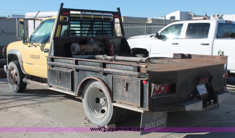 image for item L6775 2001 Chevrolet Silverado 3500HD flatbed pickup truck