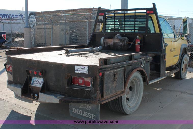 image for item L6775 2001 Chevrolet Silverado 3500HD flatbed pickup truck