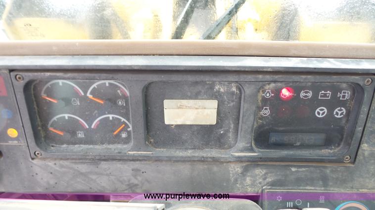 image for item J4636 1997 Caterpillar 938F wheel loader